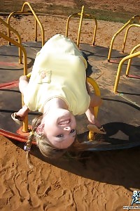 Kitty Shows Off Her Young And Appealing Body As She Flashes Her Panties At The Playground