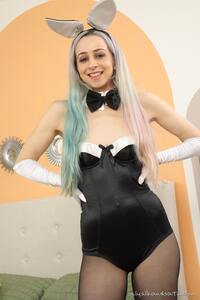 Naturally beautiful Rania Aresti in a black teasing bunny girl costume and sheer pantyhose that accentuates her legs