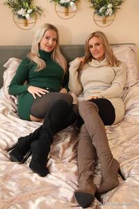 Stripping their clothes off, Any Green and Gina B flaunts their stunning bodies and legs in boots and nylons