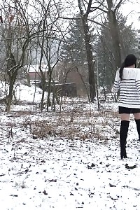 Good-looking Black Haired Slut Pisses Outside In The Snow