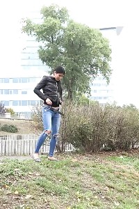 Good-looking Looking Pretty Pisses Behind A Bush