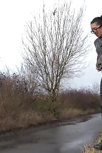 Likeable Chick In Glasses Pisses In Outdoor