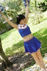 Take A Look At This Excited Cheerleader As She Undressed In The Public And Rubs Her Clit In This Porn