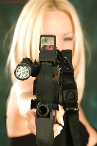 Clair Louise Looking Inviting With Her Gun