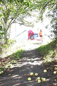 Dazzling Cutie In Shorts Pissing Over Fallen Apples