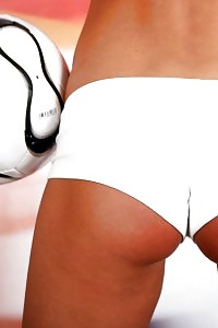 Black Haired Vera Poses Nude On The Soccer Grass