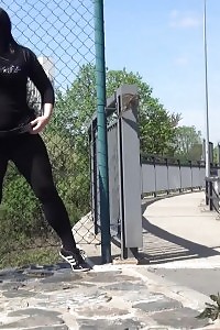 Public Pissing For Good-looking Black Haired Honey