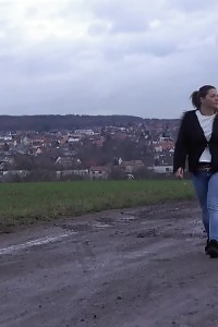 Black Haired Chick In Denims Pees Outside