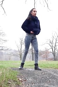 Enticing Brunette Just Can Not Stop Peeing Outside