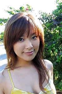 Inviting Exotic Asian Gal Displays Off Her Tight Arse And Her Cute Tits With A Smile